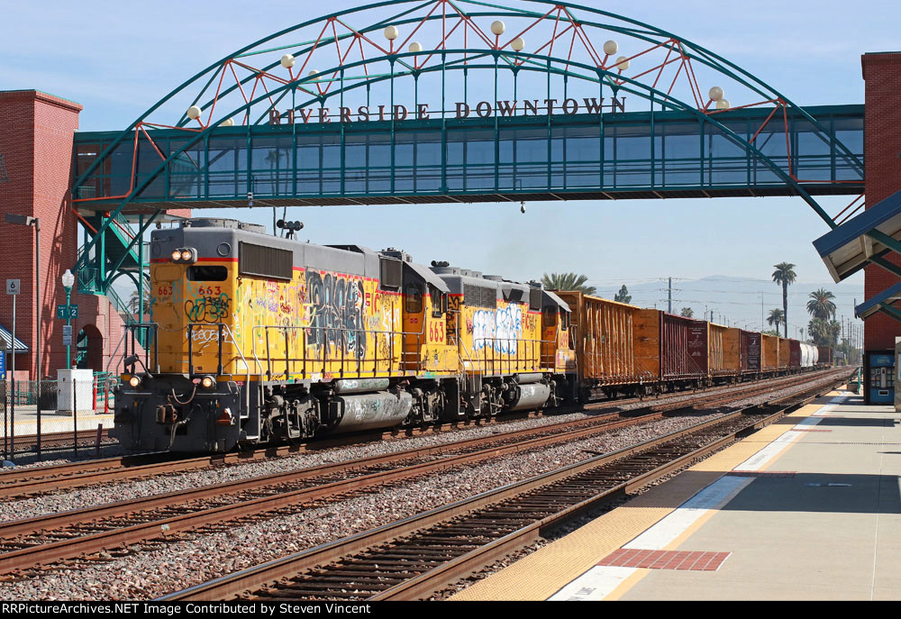 Union Pacific local with #663 and #1499 heads back to UP. 